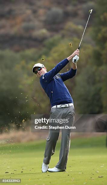 Zach Johnson hits his tsecond shot on the 18th hole during the final round of the Northwestern Mutual World Challenge at Sherwood Country Club on...