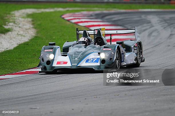 Dan Polley of Ireland and Richard Bradley of Great Britain dives the Craft Racing Oreca 03 during the Asian Lemans Series on December 8, 2013 in...