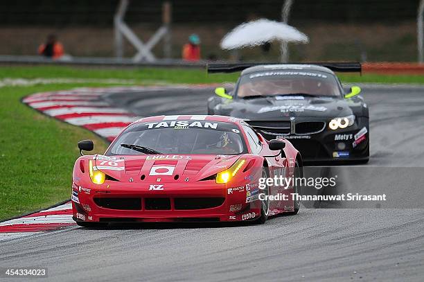 Akira Iida of Japan, Morris Chen go Germany and Ryohei Sakaguchi of Japan dives the Team Taisan Ken Endless Ferrari 458 GTE during the Asian Lemans...