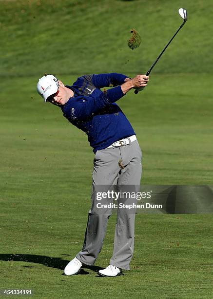 Zach Johnson hits his second shot on the 10th hole during the final round of the Northwestern Mutual World Challenge at Sherwood Country Club on...