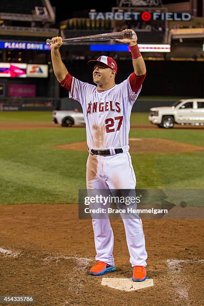 American League All-Star Mike Trout of the Los Angeles Angels poses with the MVP trophy following the 85th MLB All-Star Game at Target Field on July...