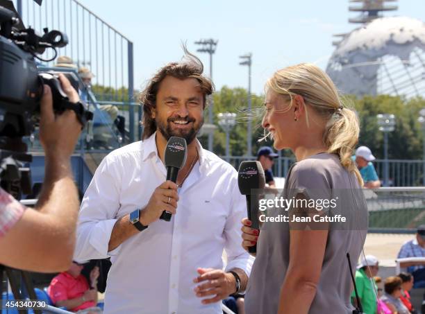 Consultants for Eurosport Henri Leconte and Barbara Schett comment on Day 4 of the 2014 US Open at USTA Billie Jean King National Tennis Center on...