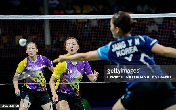 South Korea's Lee So Hee and Shin Seung Chan compete against South Korea's Jang Ye Na and Kim So Young during the women's double quarter final match...