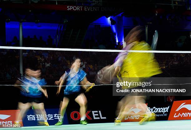 South Korea's Jang Ye Na and Kim So Young compete against South Korea's Lee So Hee and Shin Seung Chan during the women's double quarter final match...