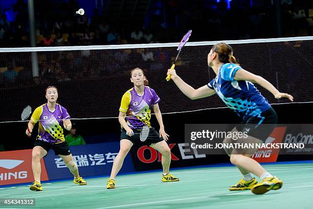 South Korea's Lee So Hee and Shin Seung Chan compete against South Korea's Jang Ye Na and Kim So Young during the women's double quarter final match...