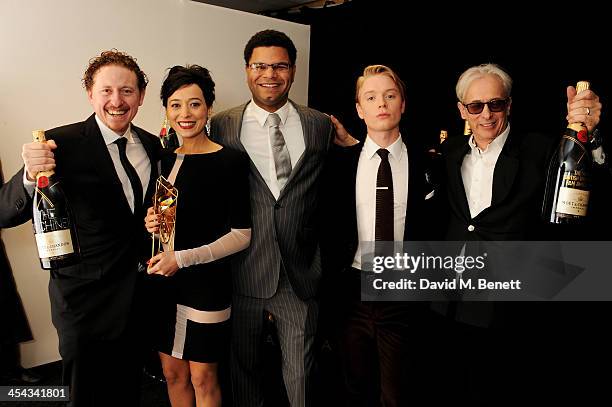 Director Caradog W. James, actress Pooneh Hajimohammadi and producer John Giwa-Amu, winners of the Raindance Award for "The Machine" pose backstage...