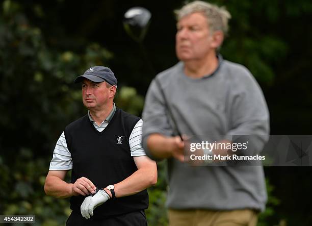 Alastair McLean , of Duddingston Golf Club with playing partner Bill Lothian on the 13th tee during the Golfplan Insurance PGA Pro-Captain Challenge...