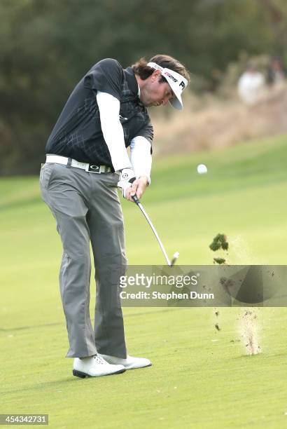 Bubba Watson hits his second shot on the 18th hole during the final round of the Northwestern Mutual World Challenge at Sherwood Country Club on...
