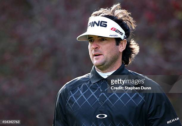 Bubba Watson walks off the tee on the second hole during the final round of the Northwestern Mutual World Challenge at Sherwood Country Club on...