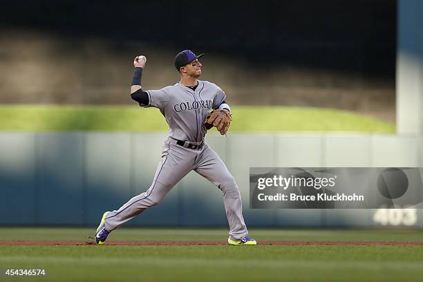 National League All-Star Troy Tulowitzki of the Colorado Rockies fields a ball hit by the American League during the 85th MLB All-Star Game at Target...