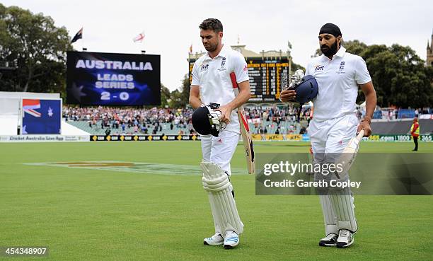 James Anderson and Monty Panesar of England leave the field after losing the Second Ashes Test Match between Australia and England at Adelaide Oval...