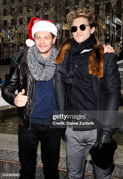 Actors Brett Dier and Keegan Allen attend 25 Days Of Christmas Winter Wonderland event at Rockefeller Center on December 8, 2013 in New York City.