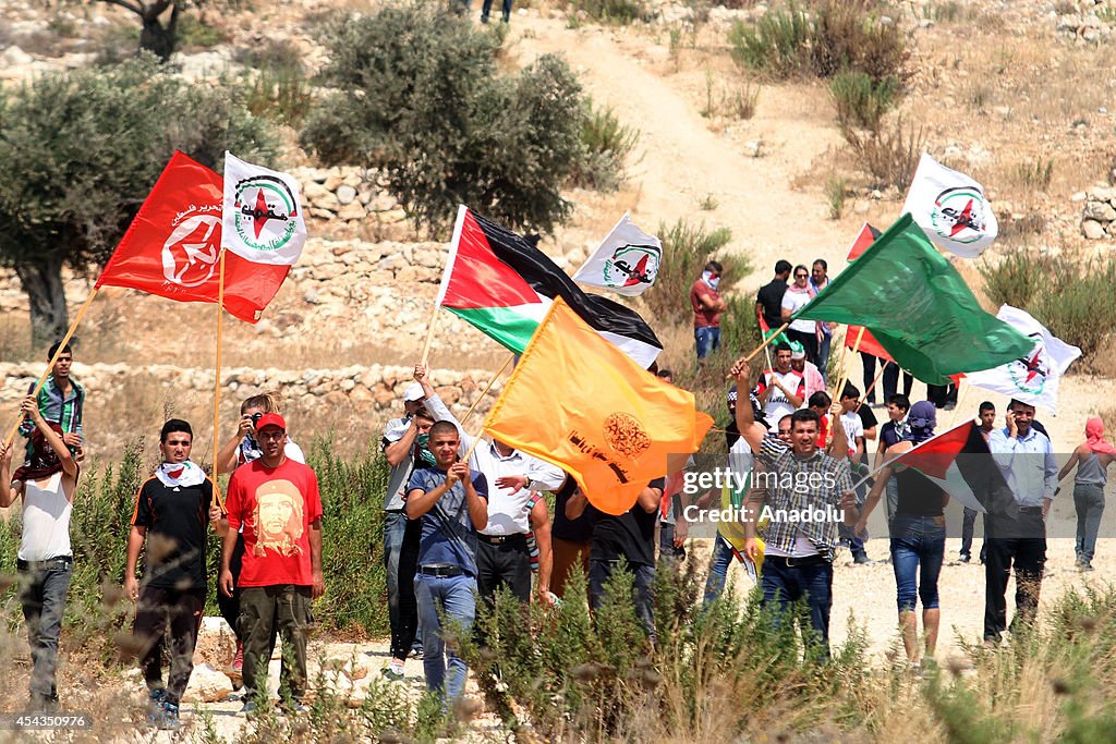 Protest in Ramallah against Israel's West Bank barrier and attacks on Gaza