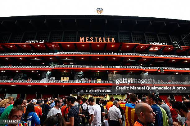 Valencia CF fans arrive prior to the La Liga match between Valencia CF and Malaga CF at Estadi de Mestalla on August 29, 2014 in Valencia, Spain.