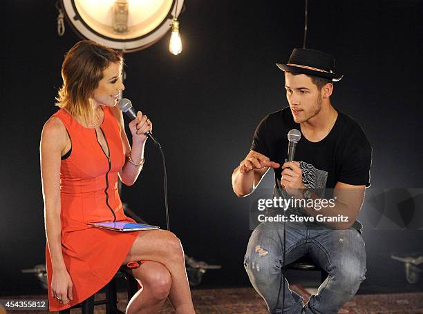 Shira Lazar and Nick Jonas Vistis "What's Trending" at YouTube Space LA on August 29, 2014 in Los Angeles, California.