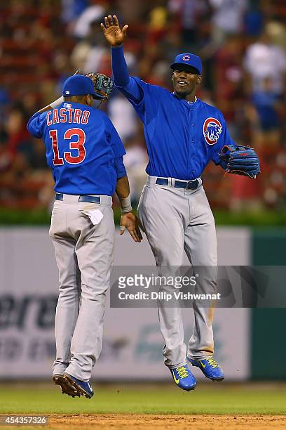 Starlin Castro and Jorge Soler celebrate after beating the St. Louis Cardinals at Busch Stadium on August 29, 2014 in St. Louis, Missouri. The Cubs...