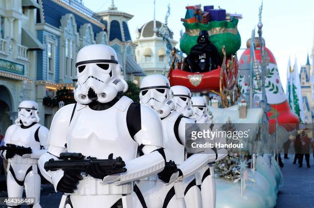 In this handout photo provided by Disney Parks, Storm Troopers and Darth Vader participate in the Disney Parks Christmas Day Parade television...