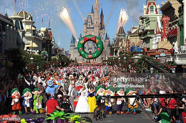 In this handout photo provided by Disney Parks, Actor Neil Patrick Harris hosts and performs in the Disney Parks Christmas Day Parade television...