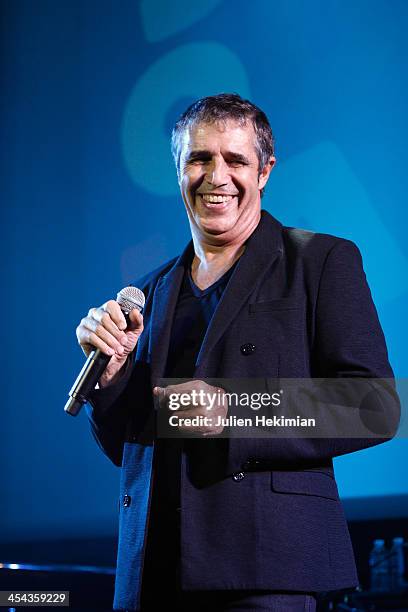 Julien Clerc performs on stage during the 50th anniversary celebration of french radio France Inter at La Gaite Lyrique on December 8, 2013 in Paris,...