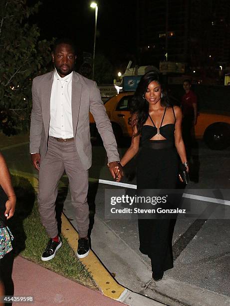 Dwyane Wade and Gabrielle Union leave their wedding rehearsal dinner at Prime 112 Steakhouse on August 29, 2014 in Miami Beach, Florida.