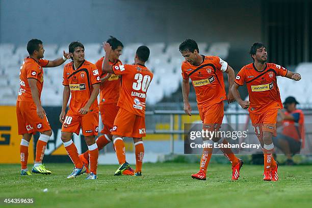 Cristian Gaitan of Cobreloa celebrates after scoring during a match between Cobreloa and Universidad de Chile as part of the Torneo Apertura 2013...