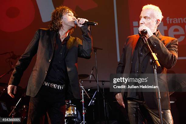 Bernard Lavilliers and Cali perform on stage during the 50th anniversary celebration of french radio France Inter at La Gaite Lyrique on December 8,...