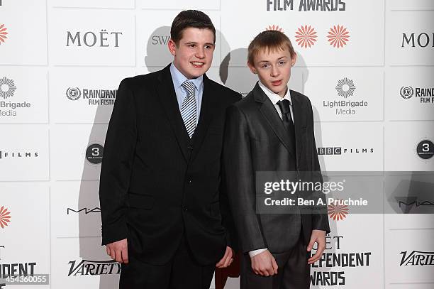 Actors Shaun Thomas and Conner Chapman arrive on the red carpet for the Moet British Independent Film Awards at Old Billingsgate Market on December...