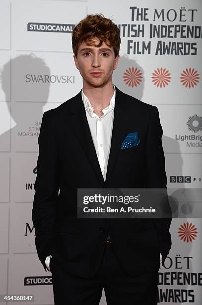 Actor Luke Newberry arrives on the red carpet for the Moet British Independent Film Awards at Old Billingsgate Market on December 8, 2013 in London,...