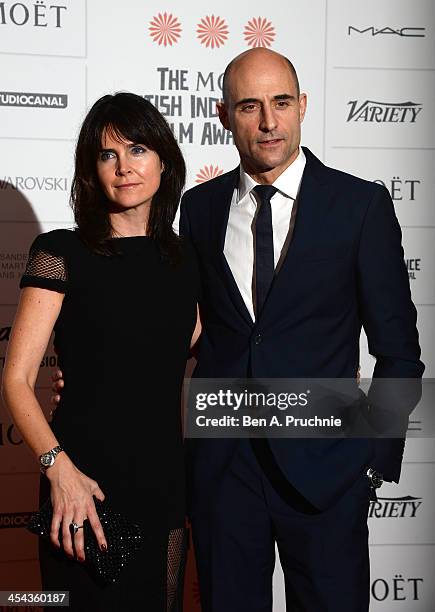 Actor Mark Strong and his wife producer Liza Marshall arrive on the red carpet for the Moet British Independent Film Awards at Old Billingsgate...