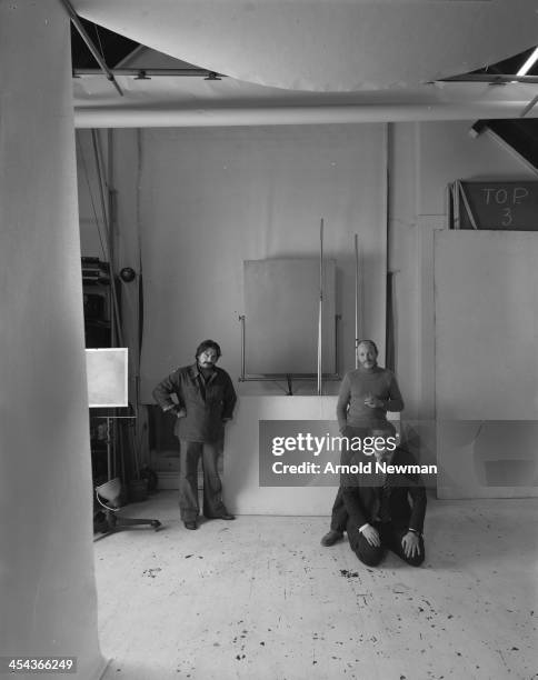 Group portrait of British photographers, from left, David Bailey, Brian Duffy , and Terence Donovan as they pose together at Swiss Cottage, London,...