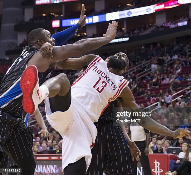 Orlando Magic power forward Glen Davis , left, is called for a flagrant foul against Houston Rockets shooting guard James Harden in the second half...