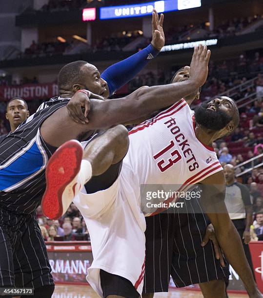 Orlando Magic power forward Glen Davis , left, is called for a flagrant foul against Houston Rockets shooting guard James Harden in the second half...