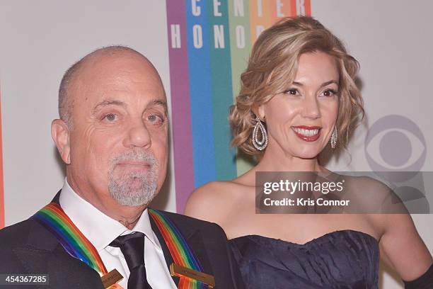 Billy Joel and Alexis Roderick pose on the red carpet during the The 36th Kennedy Center Honors gala at the Kennedy Center on December 8, 2013 in...