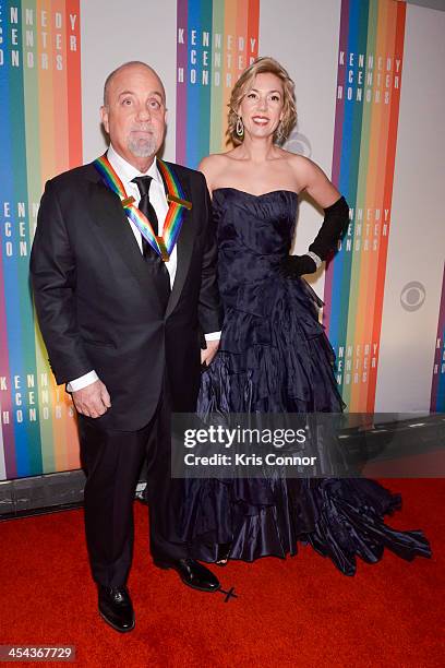 Billy Joel Alexis Roderick pose on the red carpet during the The 36th Kennedy Center Honors gala at the Kennedy Center on December 8, 2013 in...