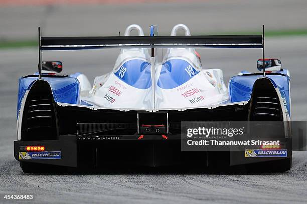 James Winslow of Great Britain and Tsujio Matsuda of Japan dives the KCMG Morgan-Nissan during the Asian Lemans Series on December 8, 2013 in Sepang,...