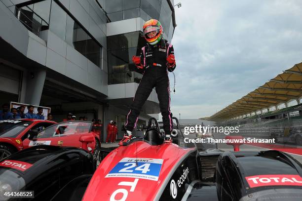 Ho-pin Tung of China driver of Oak Racing Team Total Morgan-Judd celebrates victory after the Asian Lemans Series on December 8, 2013 in Sepang,...