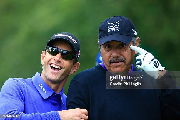 Steen Tinning and Eduardo Romero share a joke during the second round of the Travis Perkins Masters played on the Duke's Course, Woburn Golf Club on...