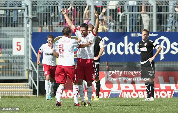 Andreas Guentner and Andreas Geipl of Regensburg celebrates Guentners 1-0 goal during the Third league match between Jahn Regensburg and Energie...