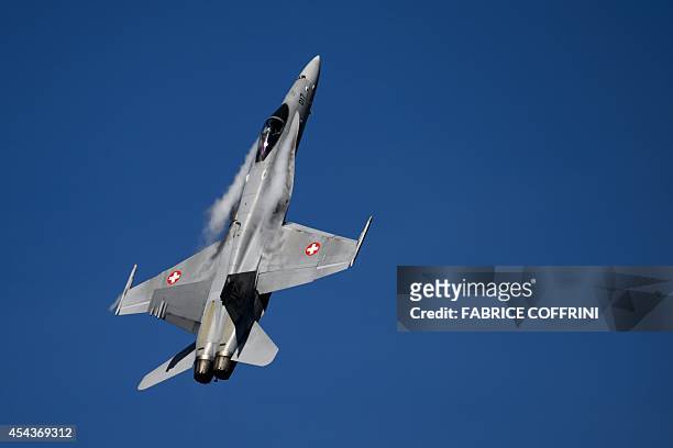 An F/A-18 Hornet fighter jet of the Swiss Air Force takes part in the first day of the AIR14 air show in Payerne, western Switzerland, on August 30,...