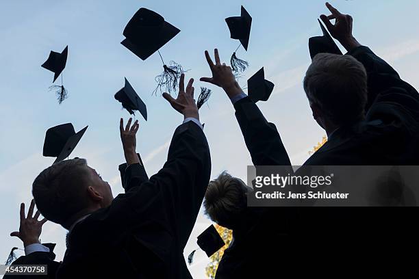 Graduates in gown and caps celebrate their graduation at the HHL Leipzig Graduate School of Management on August 30, 2014 in Leipzig, Germany. A...