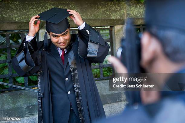 Graduates in gown and caps celebrate their graduation at the HHL Leipzig Graduate School of Management on August 30, 2014 in Leipzig, Germany. A...