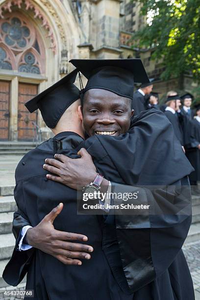 Graduates in gown and caps celebrate their graduation at the HHL Leipzig Graduate School of Management on August 30, 2014 in Leipzig, Germany. A...