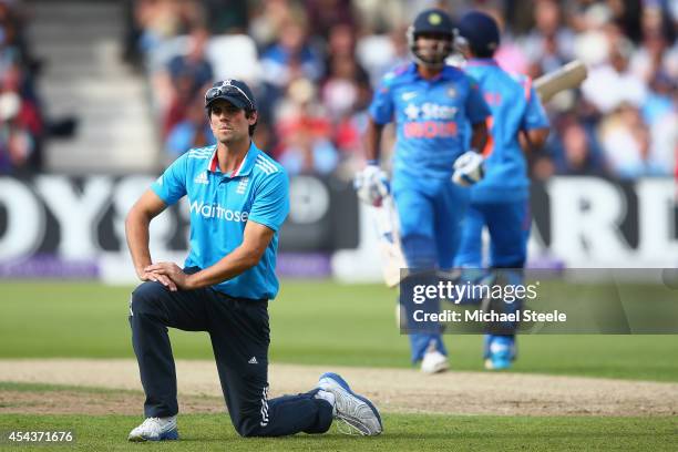 Alastair Cook the captain of England shows his frustration as Suresh Raina and Ambati Rayudu of India run between the wickets during the third Royal...