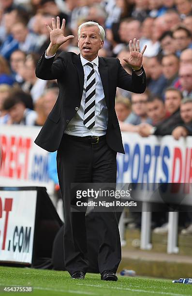 Alan Pardew, manager of Newcastle United gestures during the Barclays Premier League match between Newcastle United and Crystal Palace at St James'...