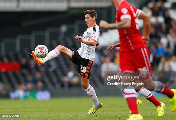 Emerson Hyndman of Fulham in action during the Sky Bet Championship match between Fulham and Cardiff City at Craven Cottage on August 30, 2014 in...