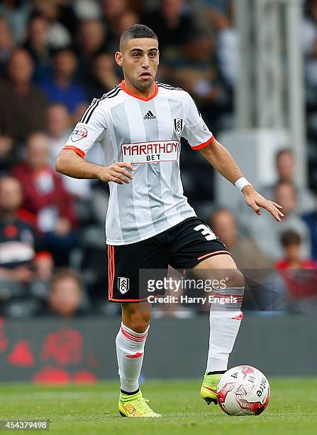 Chris David of Fulham in action during the Sky Bet Championship match between Fulham and Cardiff City at Craven Cottage on August 30, 2014 in London,...