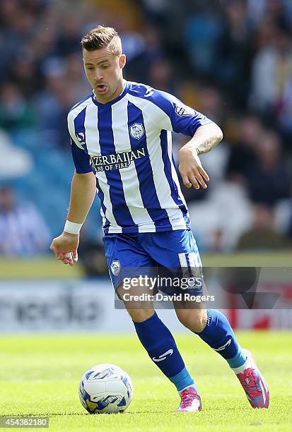 Chris Maguire of Sheffield Wednesday runs with the ball during the Sky Bet Championship match between Sheffield Wednesday and Nottingham Forest at...