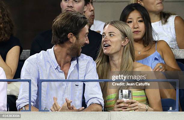 Julie Henderson and her boyfriend attend Day 3 of the 2014 US Open at USTA Billie Jean King National Tennis Center on August 27, 2014 in the Flushing...