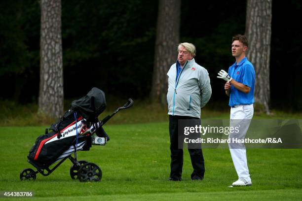 Rowan Lester of GB&I in action with team manager Peter McEvoy during his match against Vitek Novak of Europe at the final day of the Jacques Trophy...