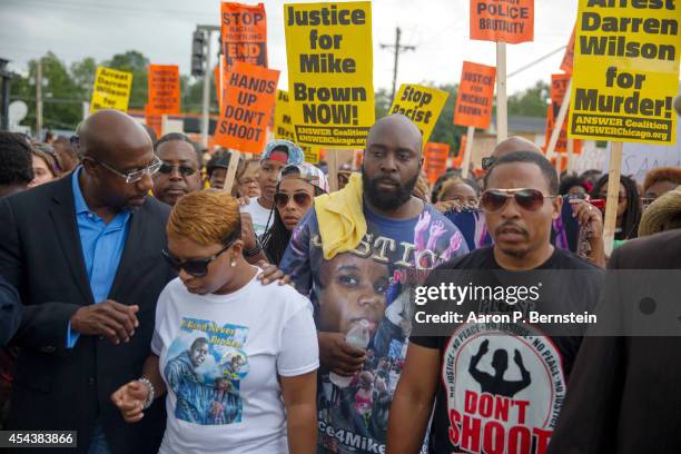 Lesley McSpadden and Michael Brown Sr. , parents of Michael Brown, march in a protest for their son on August 30, 2014 in Ferguson, Missouri. Michael...